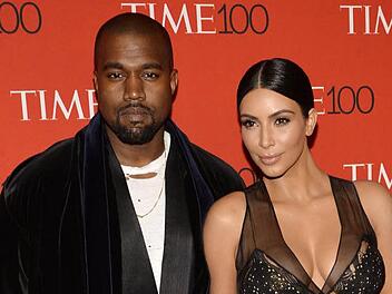 Kim Kardashian und Kanye West freuen sich über drittes Kind. Archivbild: dpa/epa/Justin Lane
